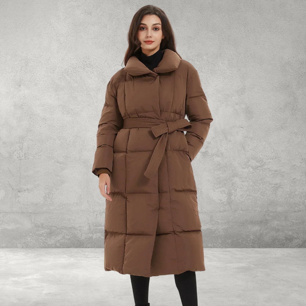 Woman wearing brown padded winter coat with tie belt