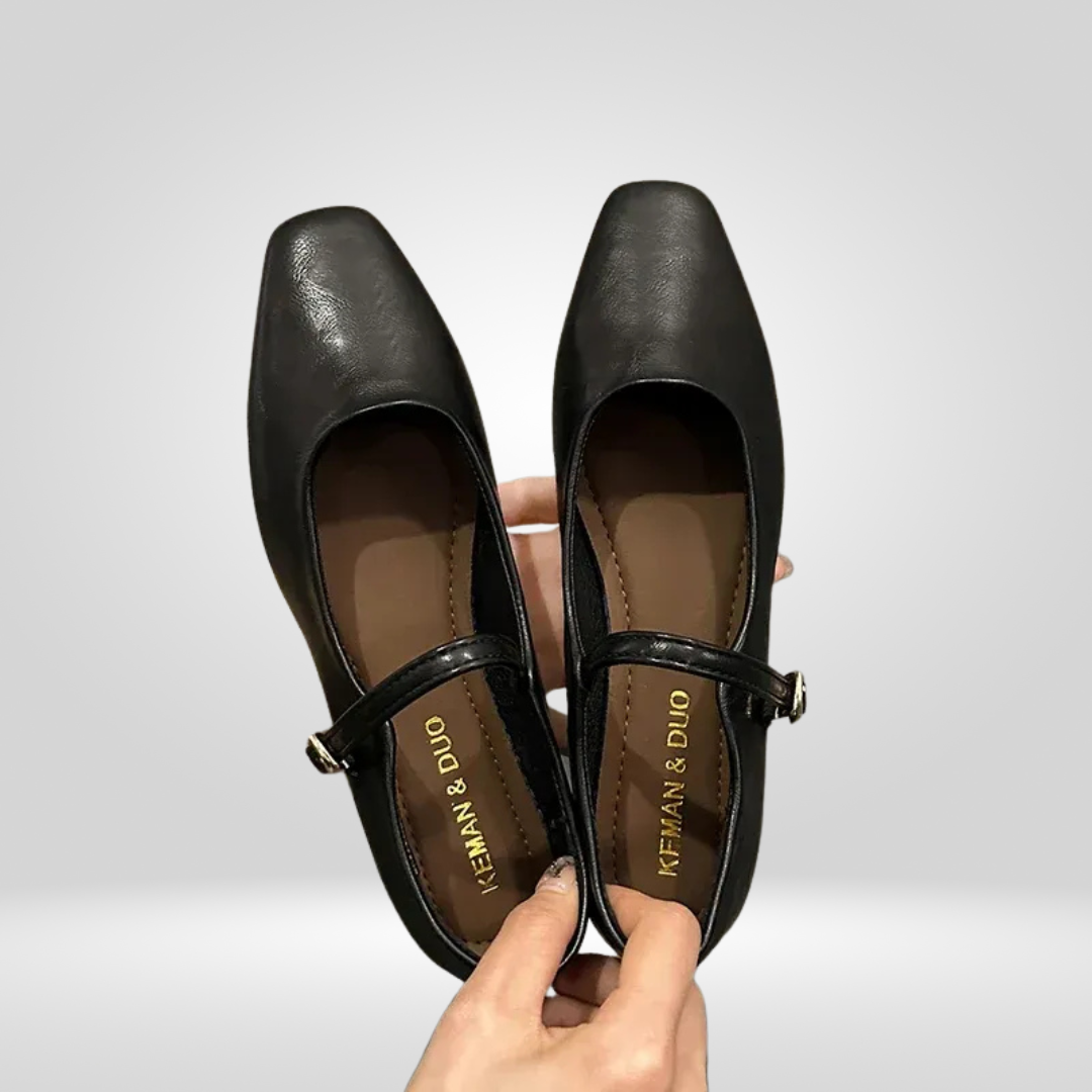 Black square toe low heel mules, pair side view