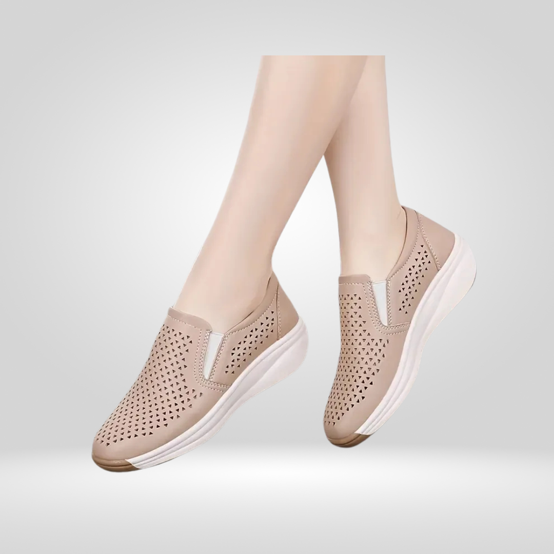 Model wearing nude cut-out platform shoes, side view