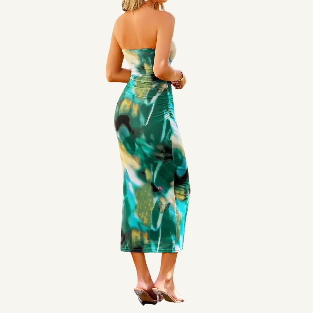 Model wearing green printed dress, full length