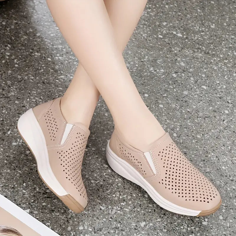 Model wearing nude platform shoes, back view