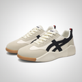 Beige and black vintage-style sneakers with contrast stripe