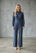 Navy blue gingham checkered jumpsuit with ruffle collar and wide leg fit front view - Velara UK