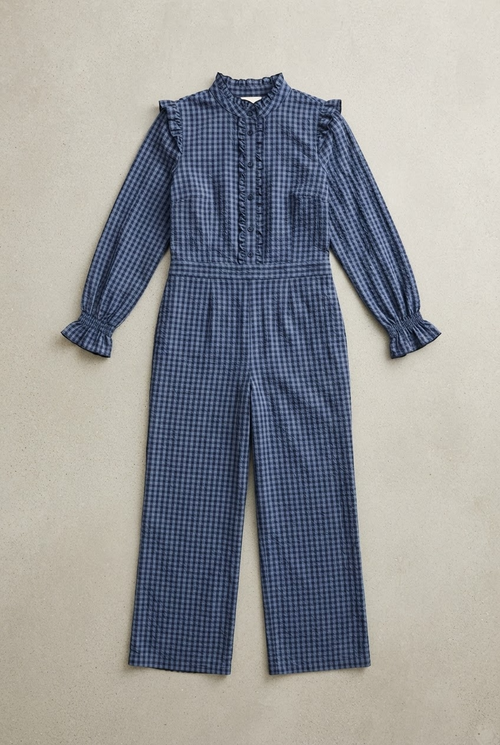 Navy blue gingham checkered jumpsuit with ruffle collar and long sleeves on hanger flatlay - Velara UK
