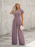 Dusty purple wide leg jumpsuit with plunging V-neck, ruched waist and flutter sleeves - Velara UK