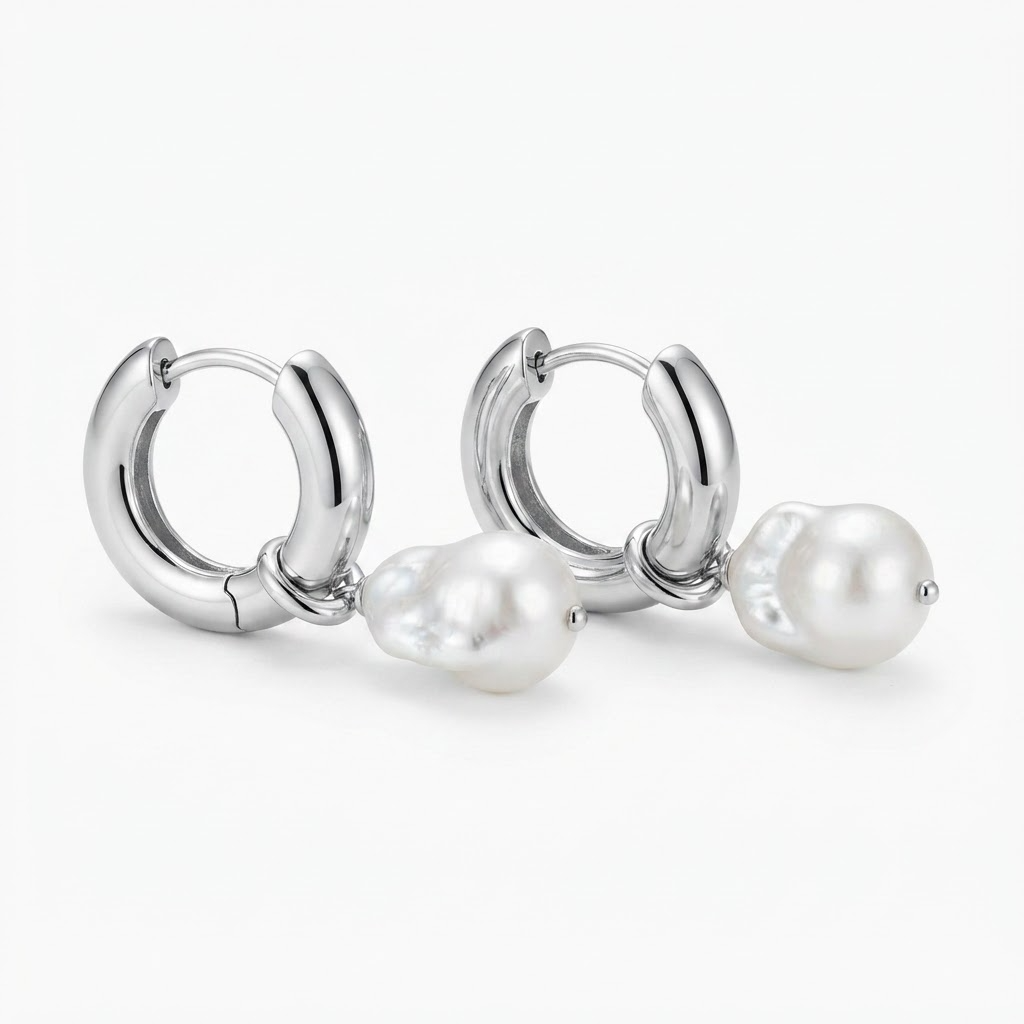 Silver-toned chunky huggie hoop earrings with baroque faux pearl drop - elegant thick hoop earrings with lustrous pearl pendant - jewelry product photo