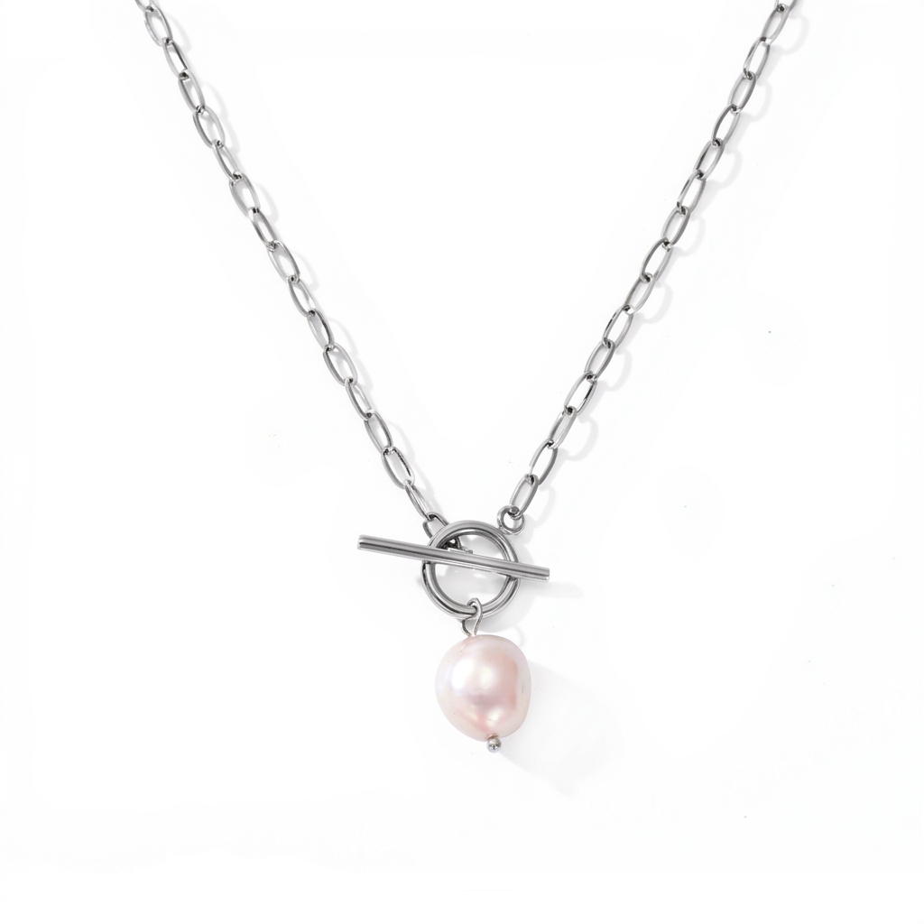 Silver-toned paperclip chain with toggle clasp and faux pearl detail - luxury necklace with link chain and pearl-like pendant - close-up product photography
