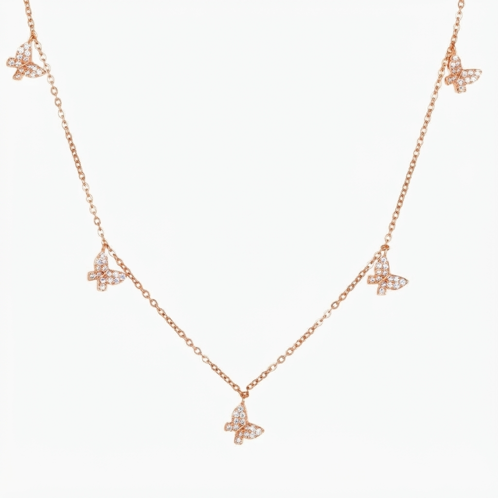 Rose gold-toned delicate chain necklace with crystal butterfly charms - elegant station style necklace with pavé crystal butterflies - jewelry product photo
