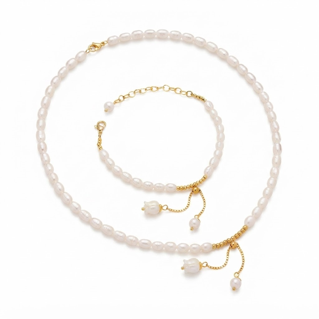 Faux pearl necklace and bracelet jewelry set with gold-toned slider closure - elegant matching pearl jewelry set with adjustable clasps and pearl drops - jewelry product photo
