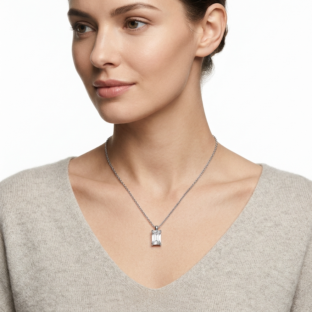 Woman wearing silver-toned stainless steel necklace - luxury jewelry lifestyle photography
