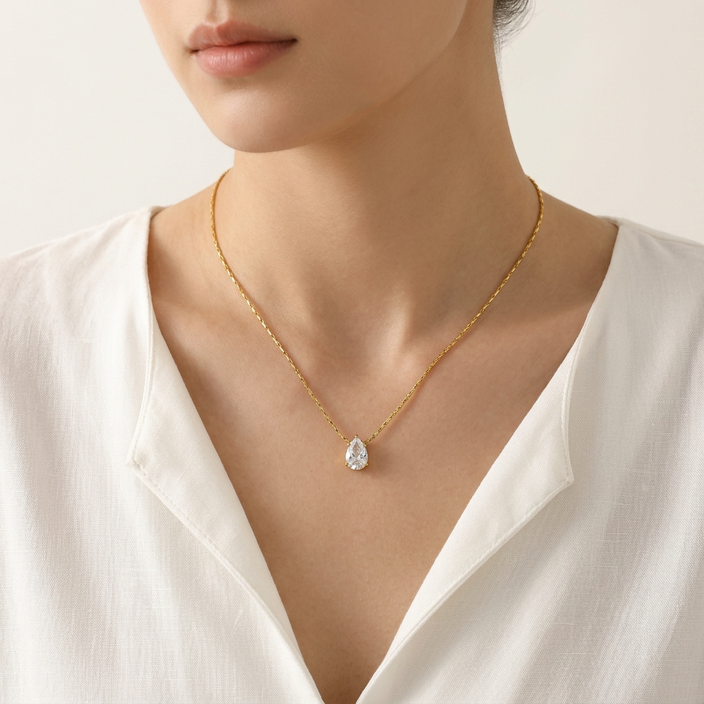 Dainty teardrop zirconia pendant necklace in gold color stainless steel – Velara-Model wearing