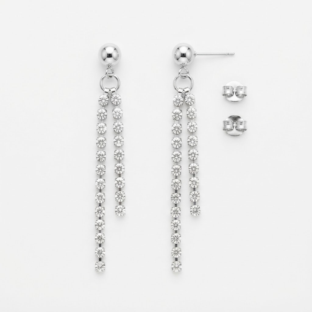 Silver-toned ball stud earrings with crystal fringe detail - luxury earrings with dual tapered crystal chains - close-up product photography