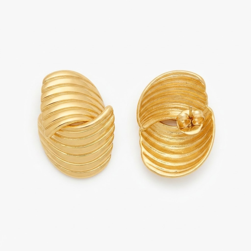 Gold-toned chunky ribbed C-hoop earrings - bold wide curved hoop earrings with horizontal textured grooves - jewelry product photo