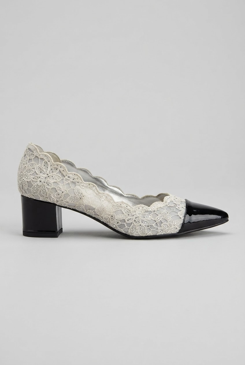 "White floral lace low block heel pump with scalloped collar and glossy black toe cap side view - Velara UK