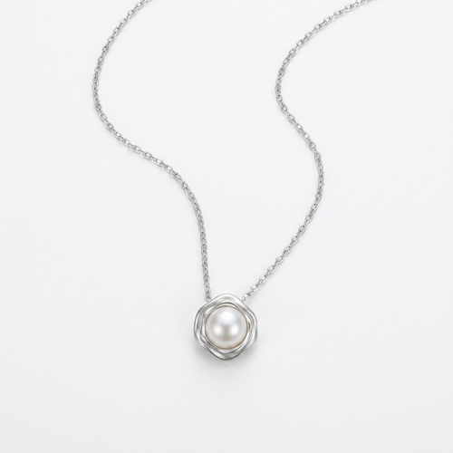 Close-up of silver color stainless steel faux pearl flower pendant necklace – Velara