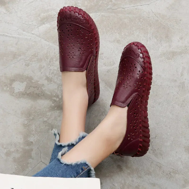 Model wearing burgundy leather loafer, top view