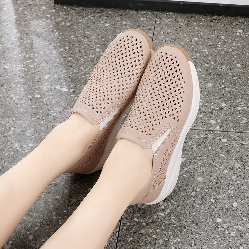 Model wearing beige platform shoes, side view
