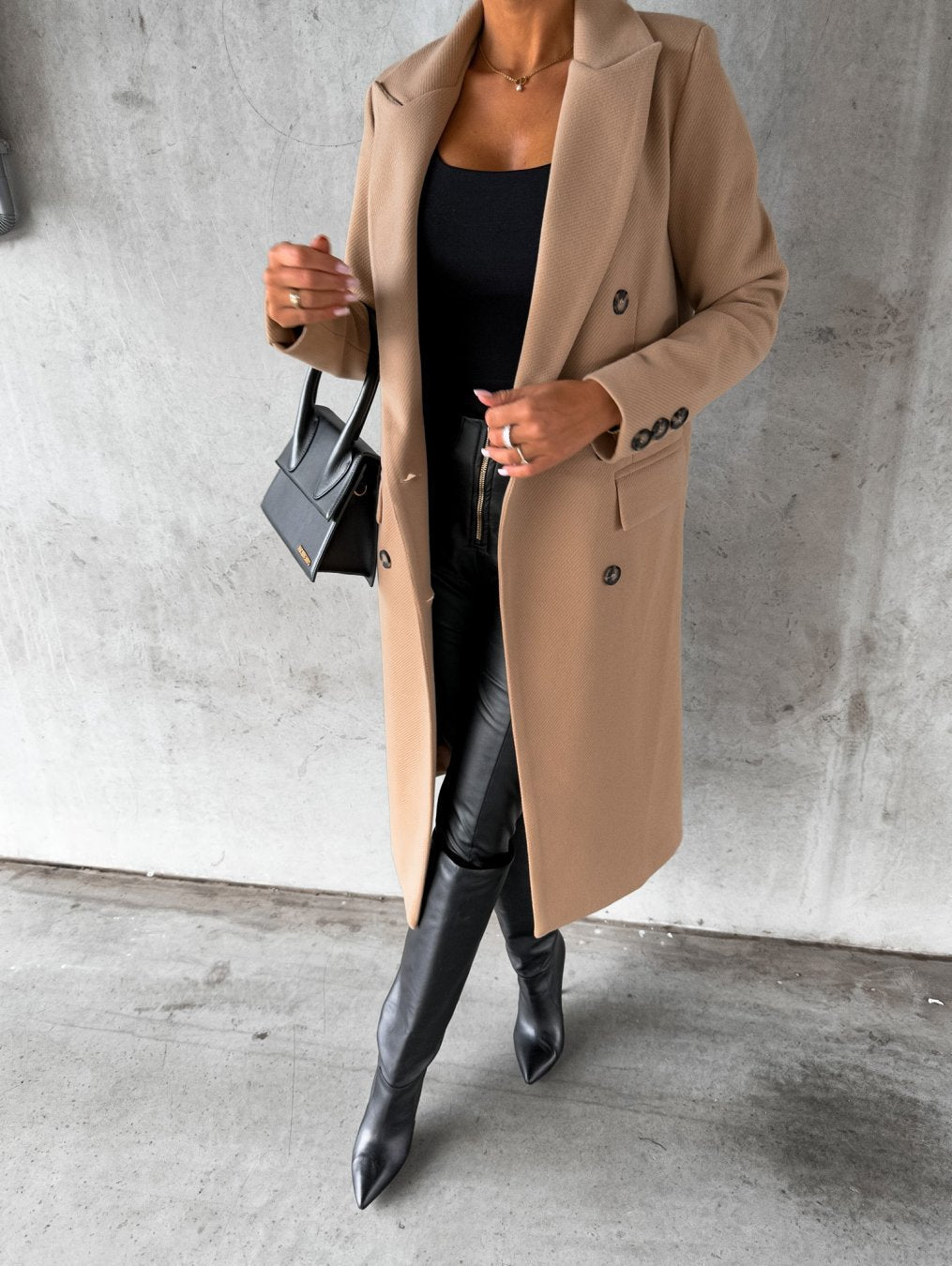 Camel double-breasted coat, side view