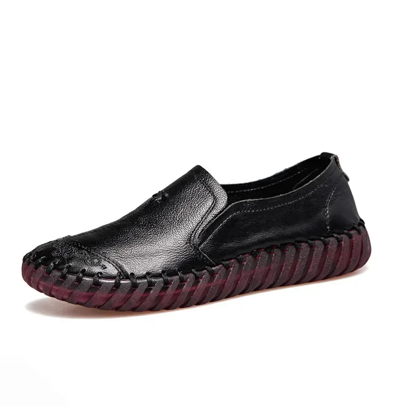 Black leather loafer, side view
