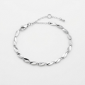Silver-toned delicate wave link bracelet with twisted mirror-shaped flat links – elegant adjustable stainless steel bracelet 20cm plus 3cm extender with reflective faceted surface – jewelry product photo