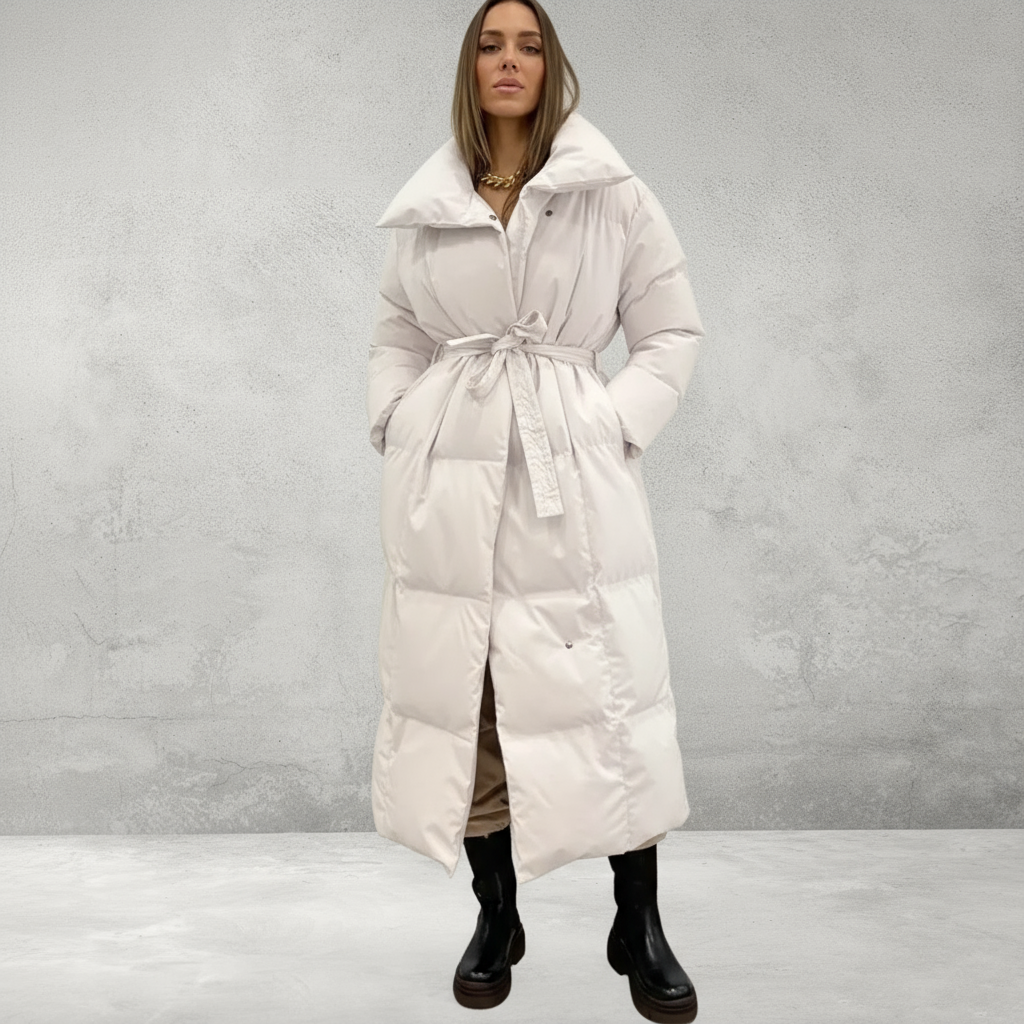 Model wearing white padded winter coat, full length