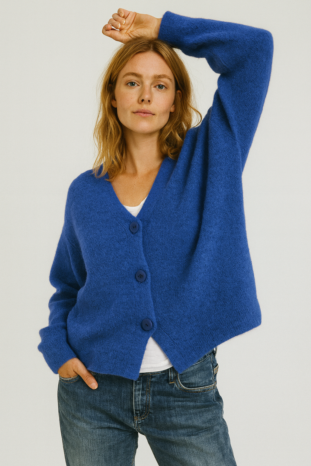 Relaxed fit knit cardigan styled with casual outfit