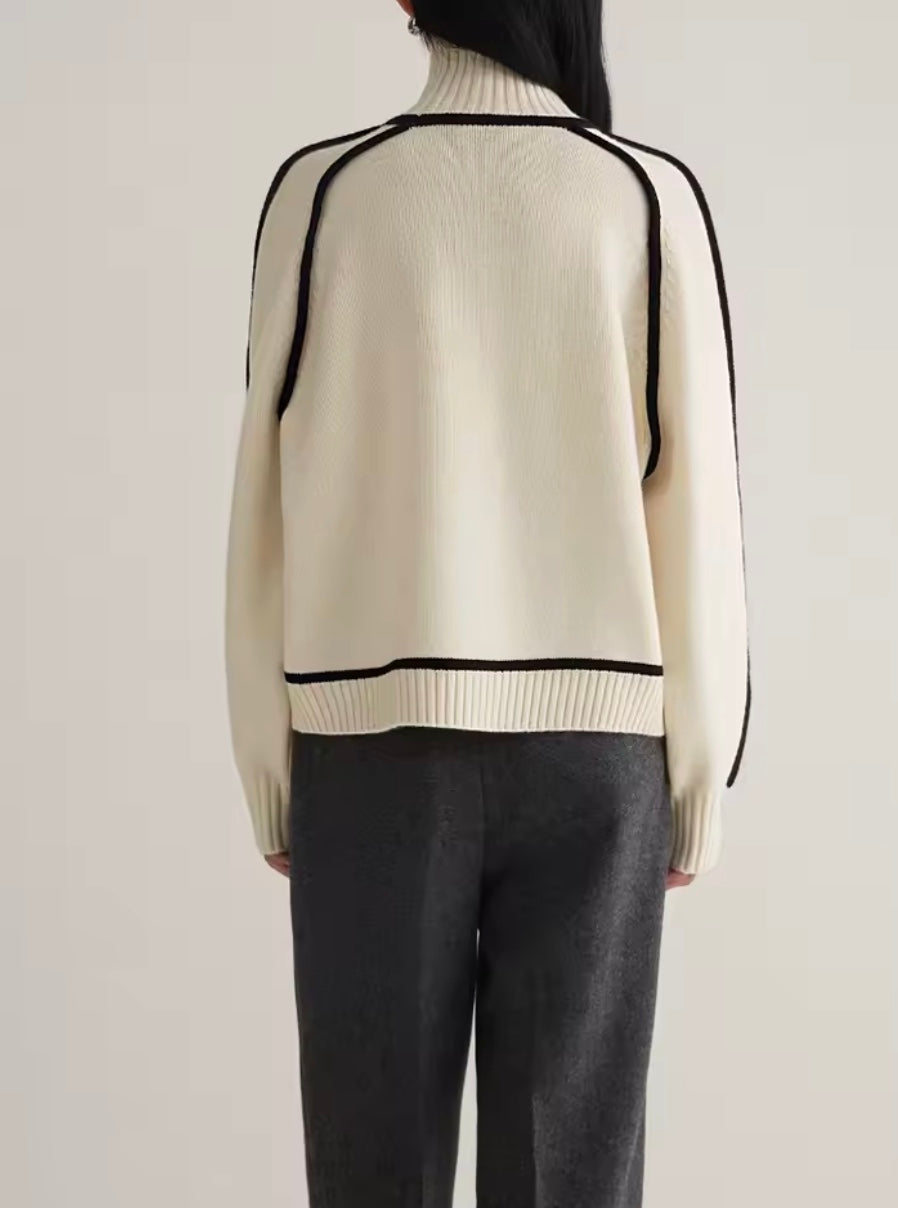 Roll neck jumper fabric texture detail