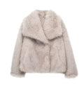 Beige faux fur jacket styled with jeans