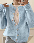 Blue knitted cardigan front view