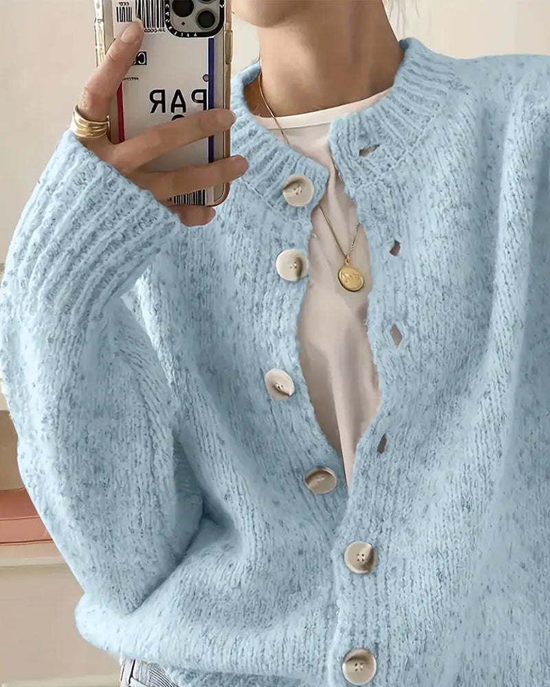Blue knitted cardigan side view