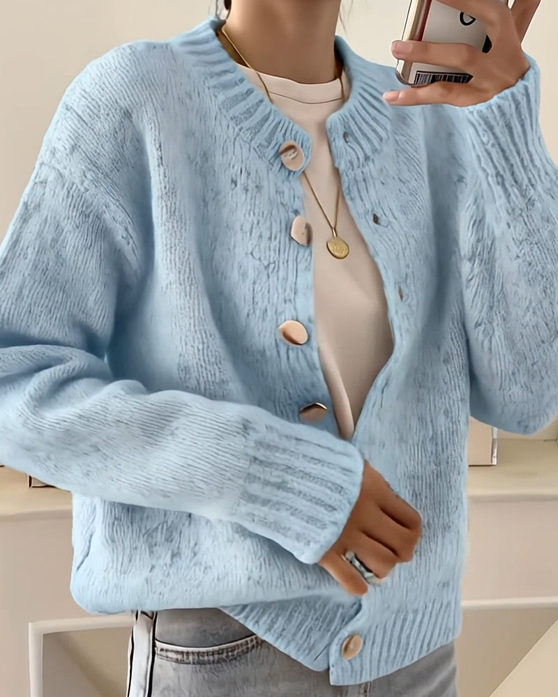 Blue knitted cardigan back view