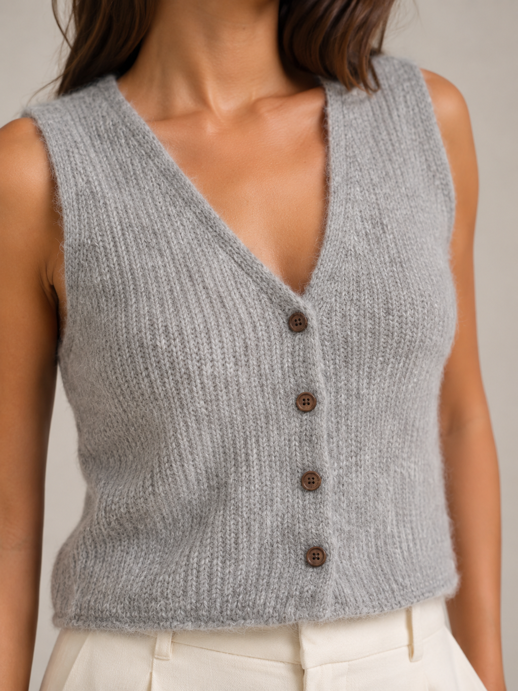 Knitted waistcoat layered outfit