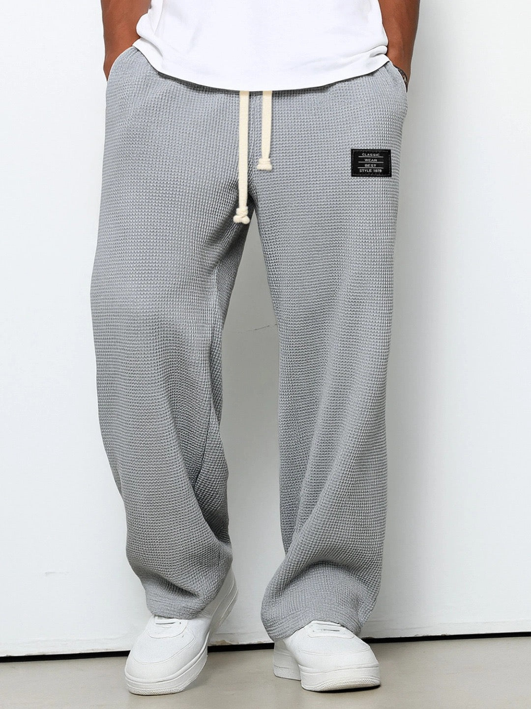 Men's trousers worn with casual t-shirt