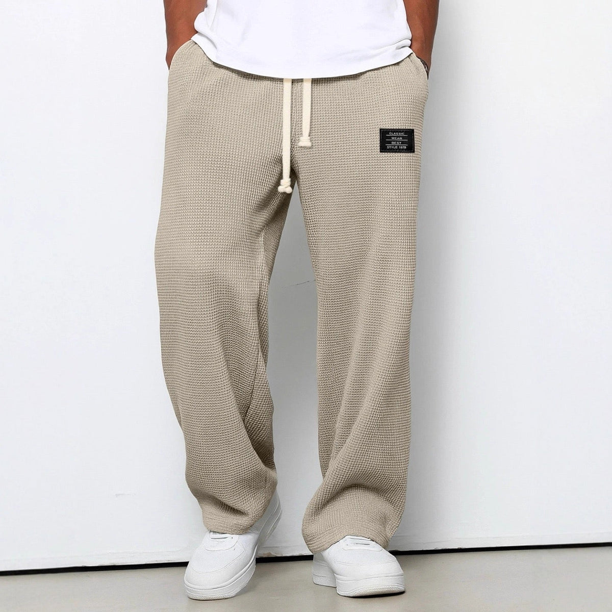Men's trousers worn with collared shirt