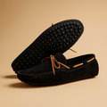 Black slip-on loafers side view