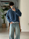 Blue crew neck jumper back view