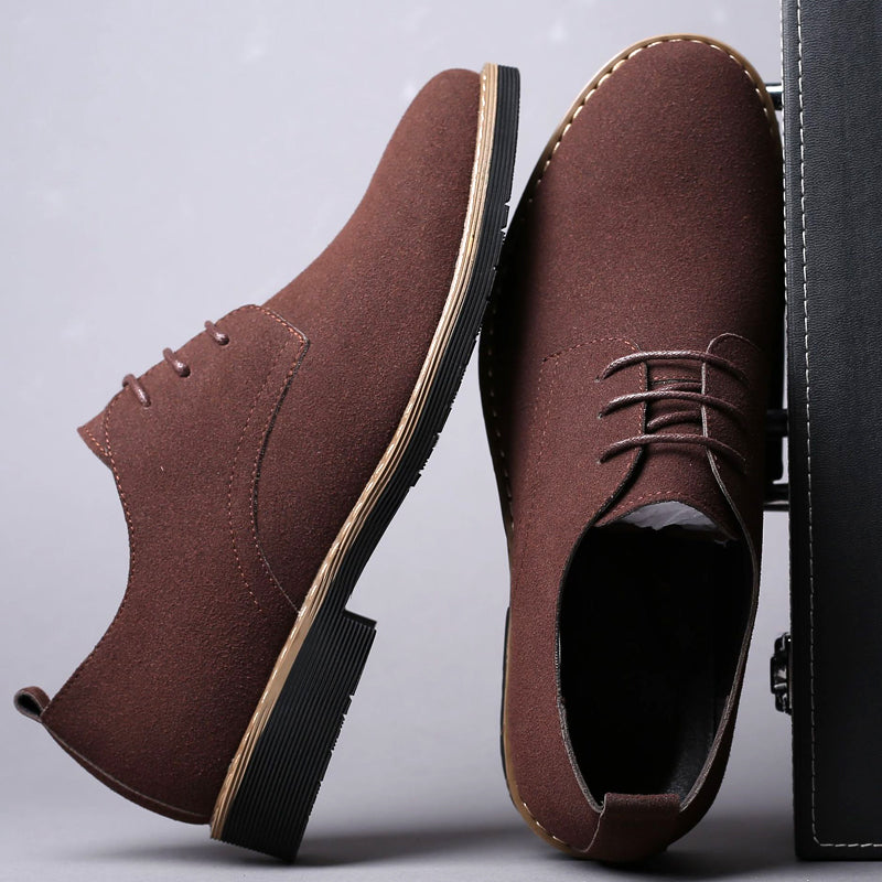 Men's suede-touch Oxford shoe worn with trousers