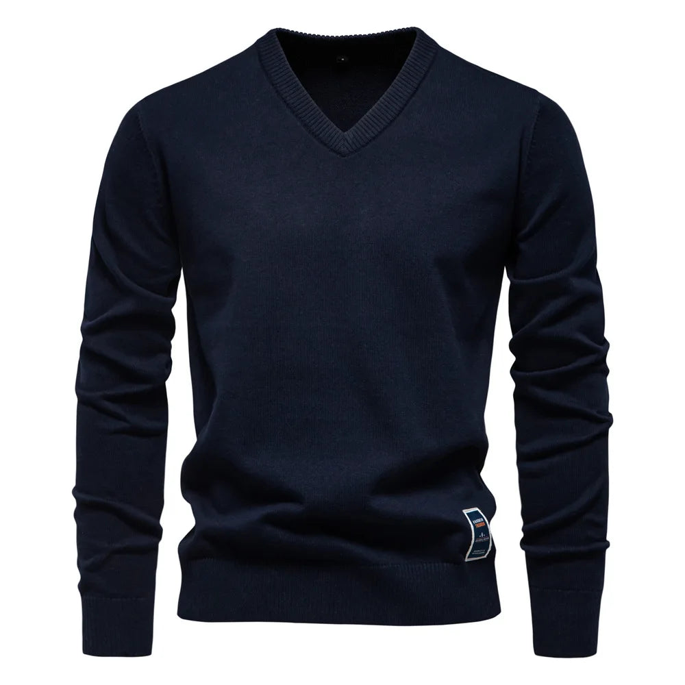 Men's V-neck knit jumper folded flat lay