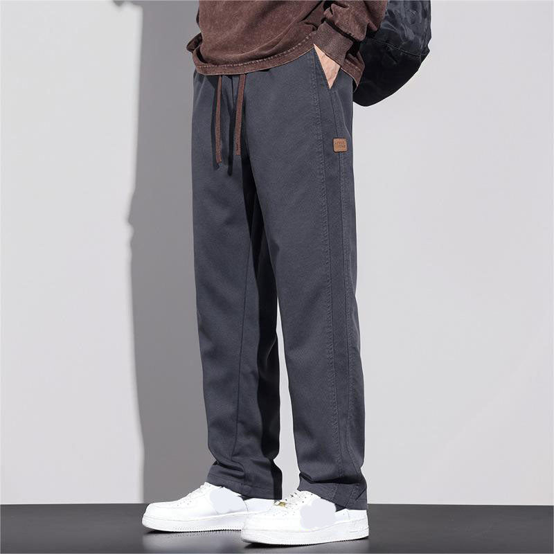 Close-up of drawstring waistband on trousers