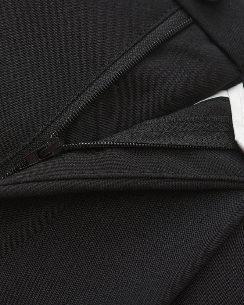 Trousers styled with overshirt and sneakers