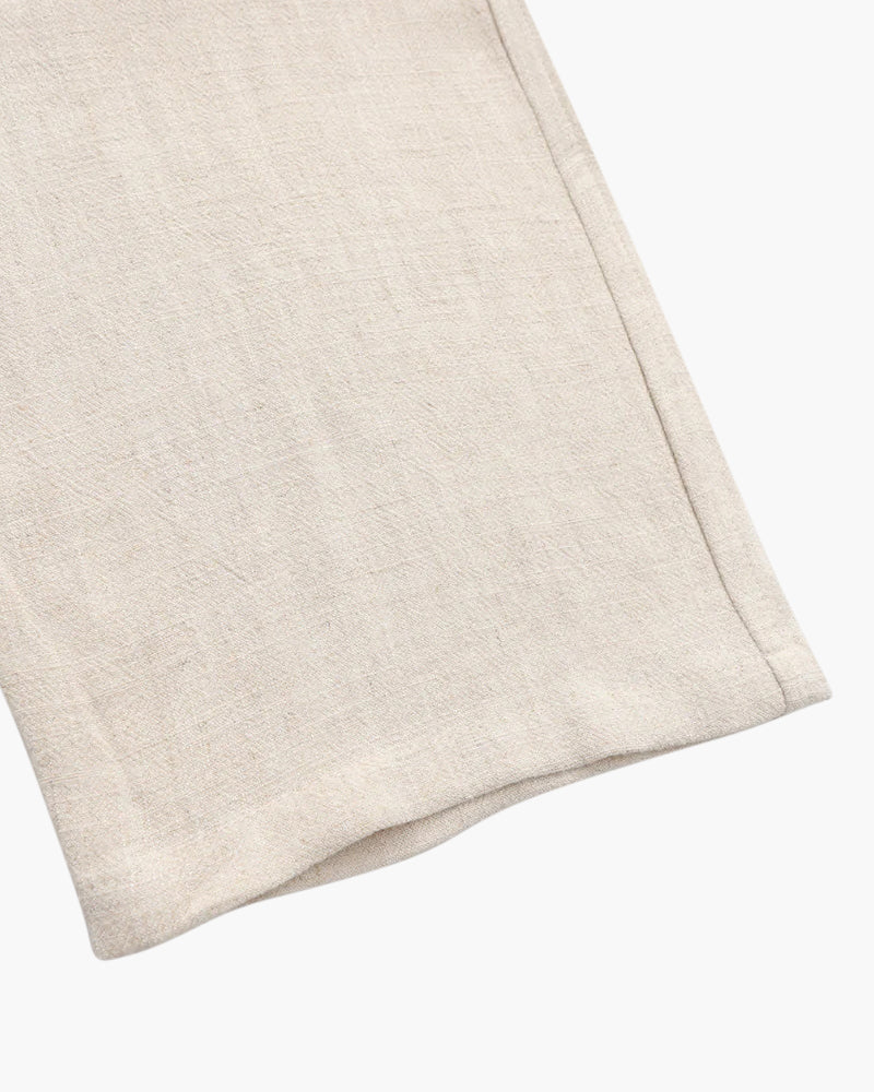 Drawstring waistband detail on trousers