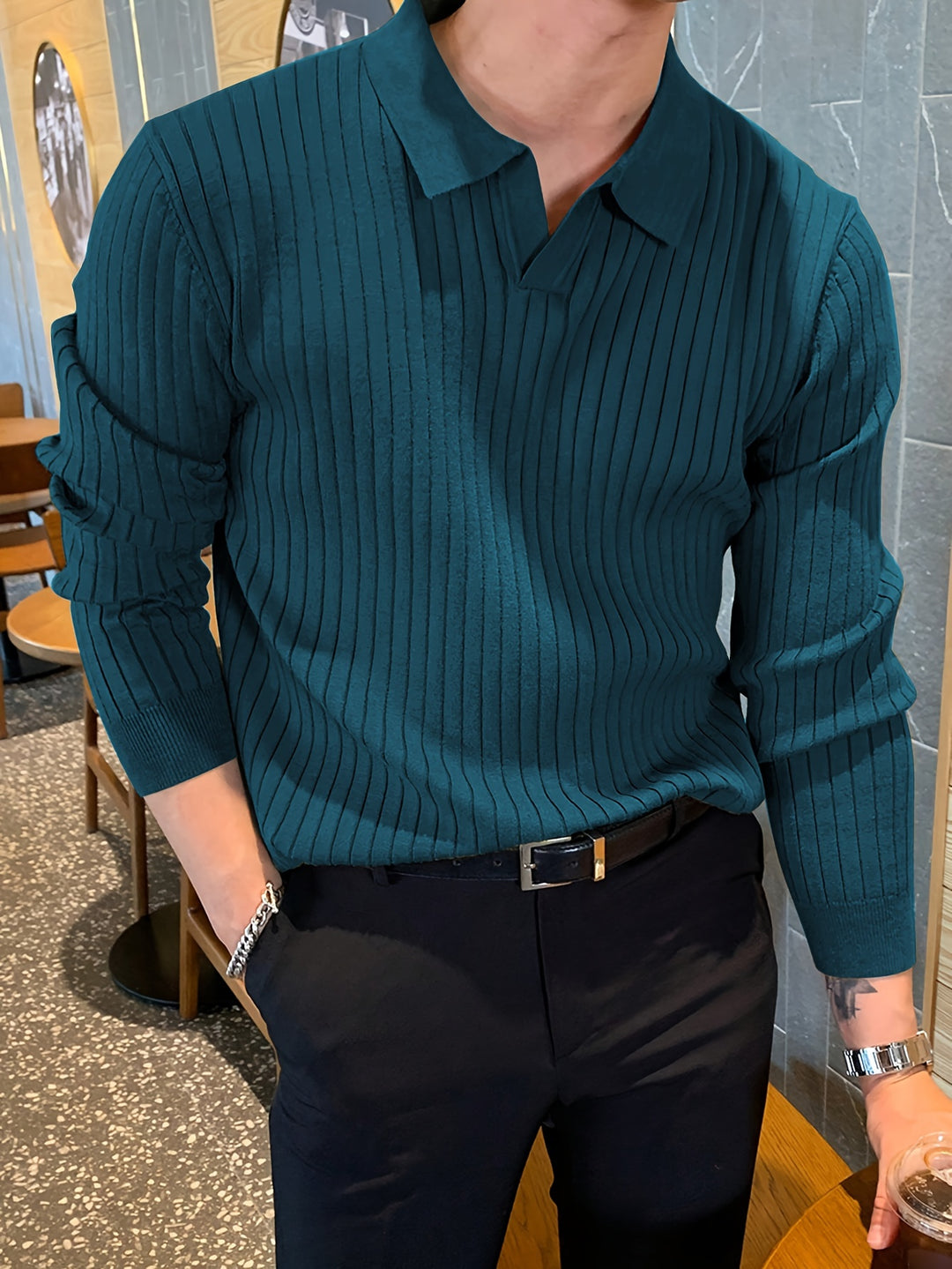 Close-up of polo collar on knit jumper