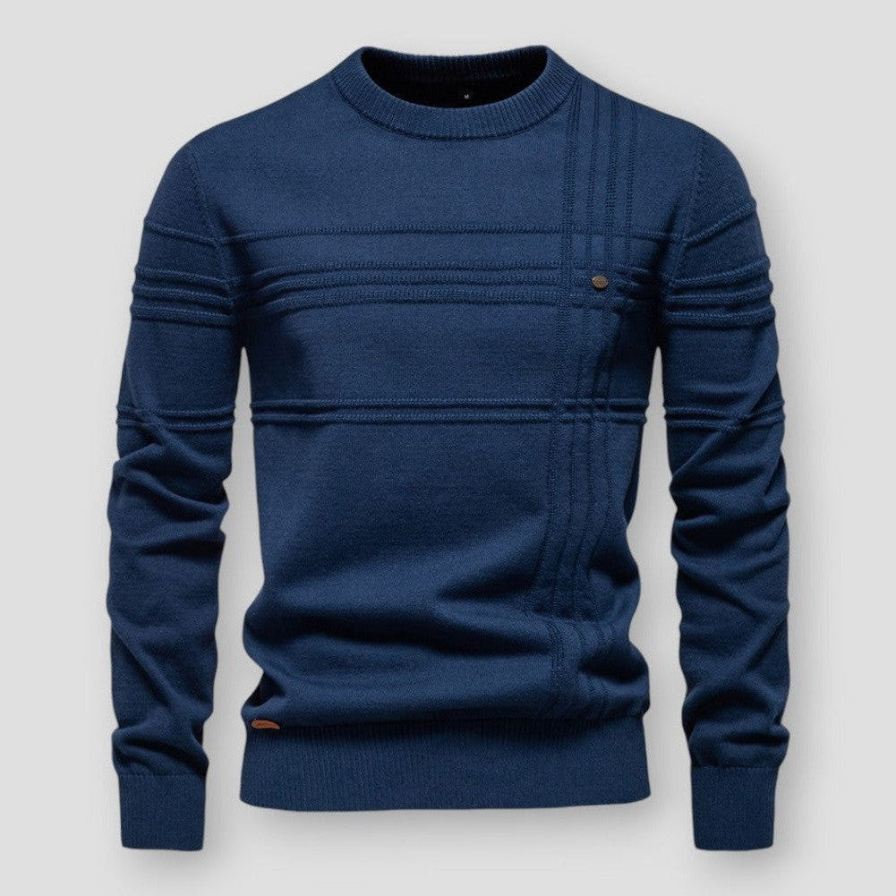 Blue crew neck sweater styled with jeans