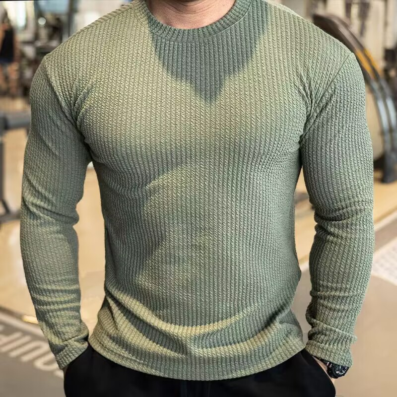 Model wearing ribbed knit jumper outdoors