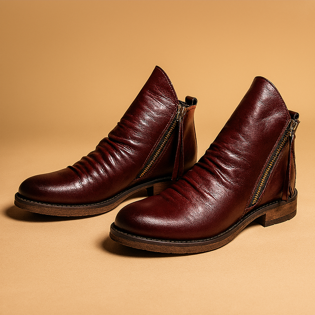 Pair of men's ankle boots on plain background