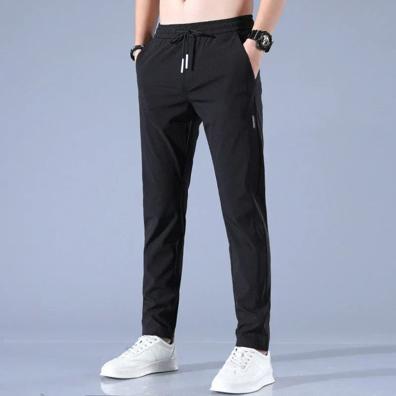 Man wearing jogger pants with hoodie