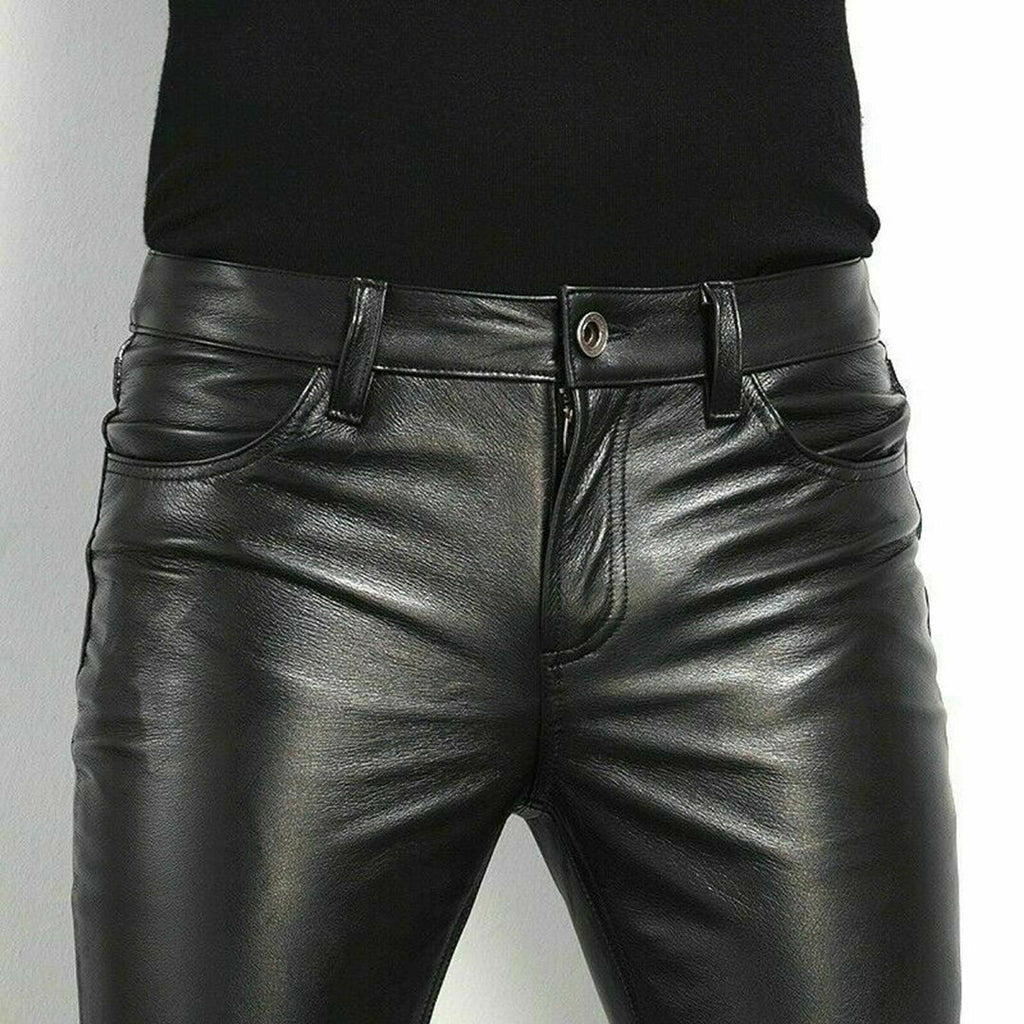 Black faux leather trousers styled with jacket