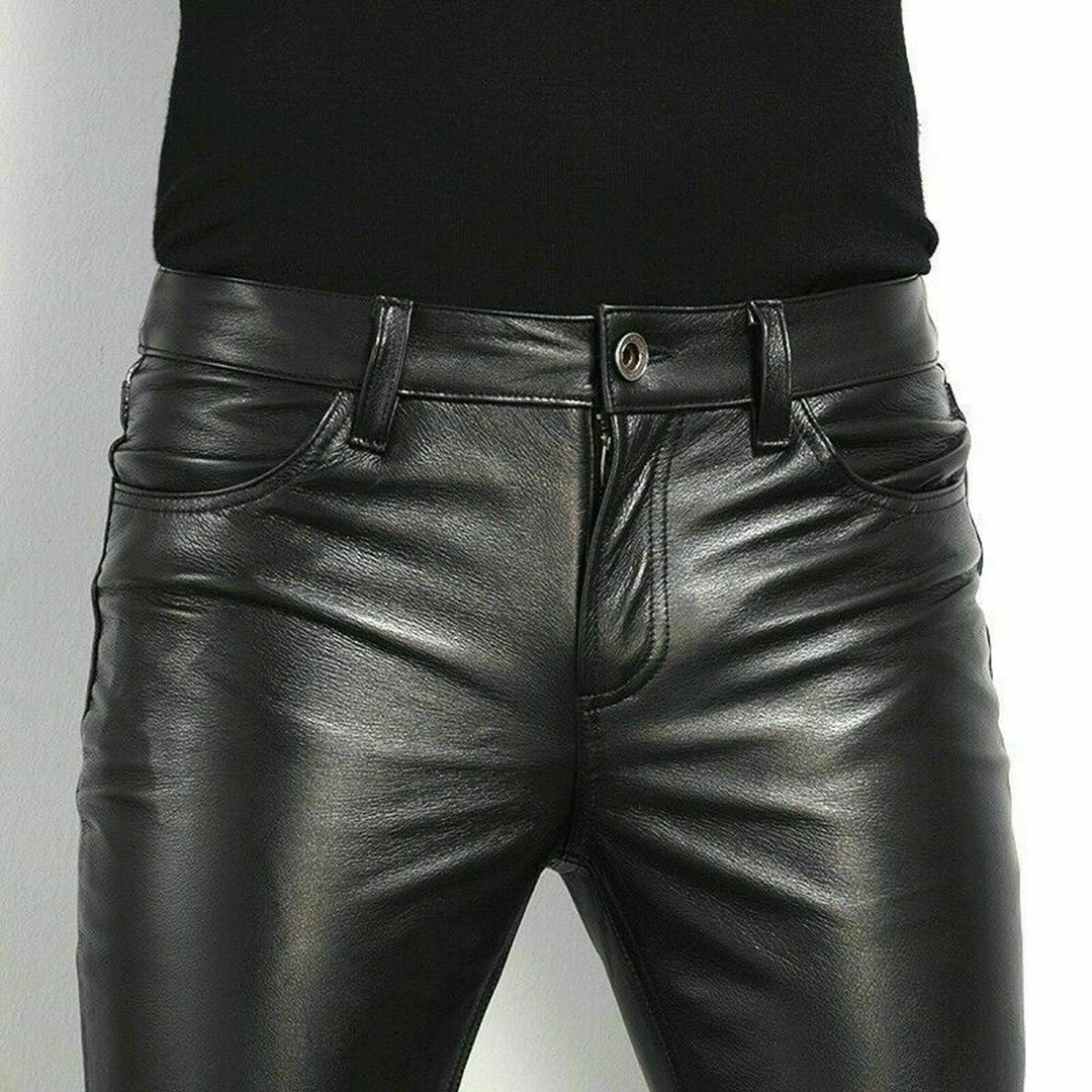 Black faux leather trousers styled with jacket