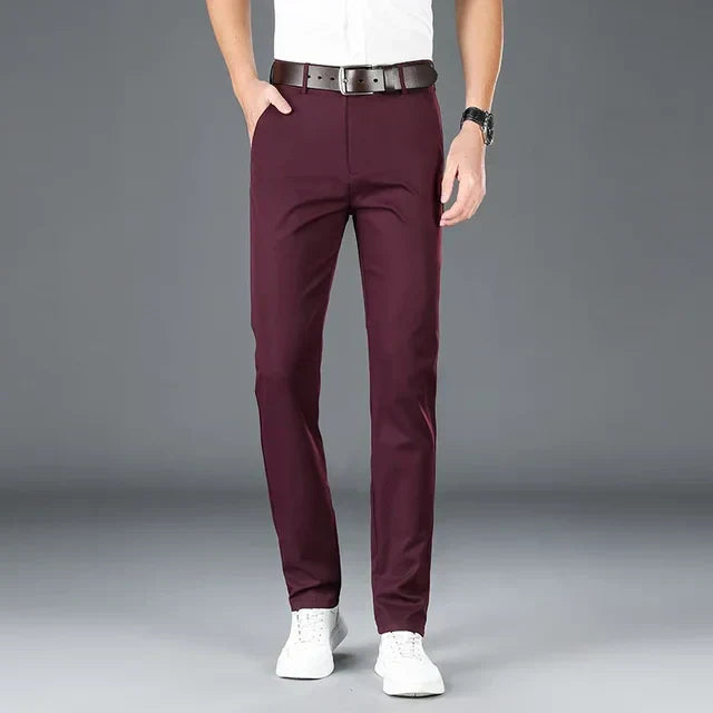 Trousers styled with polo shirt and trainers