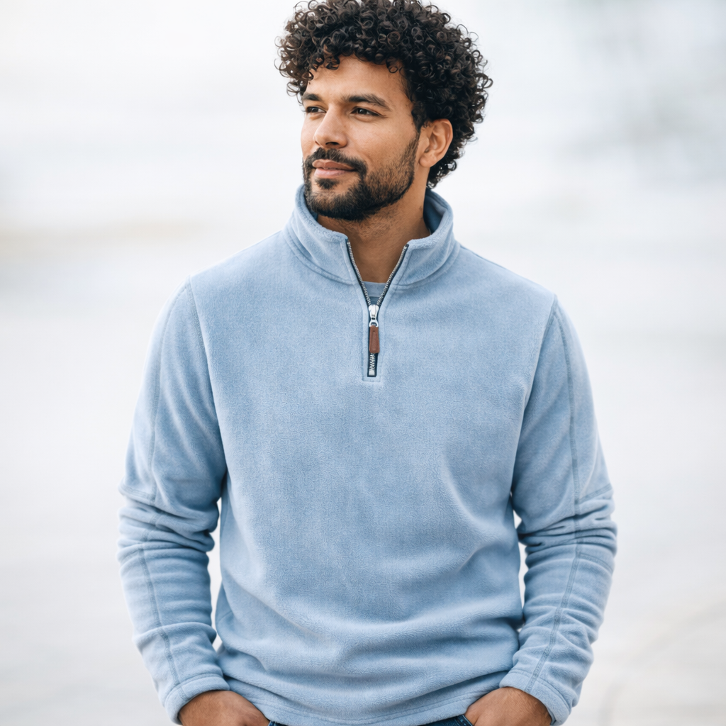 Fleece quarter-zip pullover folded flat lay